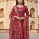 maroon Indian ethnic wear kurta, pant, and dupatta set.